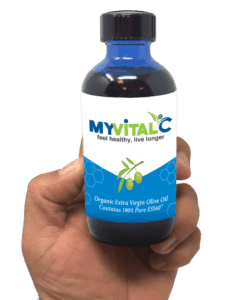MyVitalC Olive Oil Bottle in a male hand
