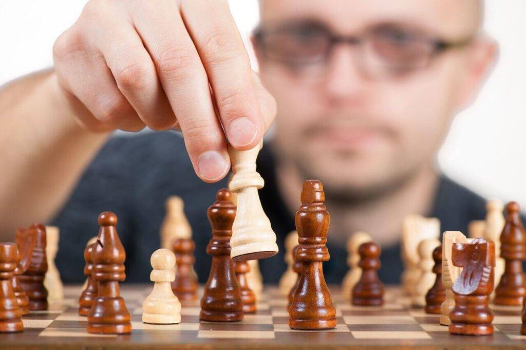A male playing chess