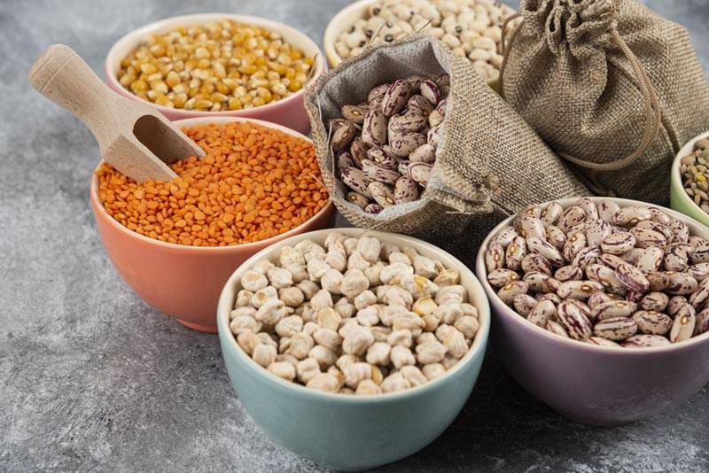 bowls of legumes on a table