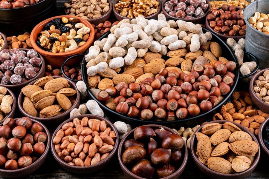 many bowls showing a wide variety of nuts